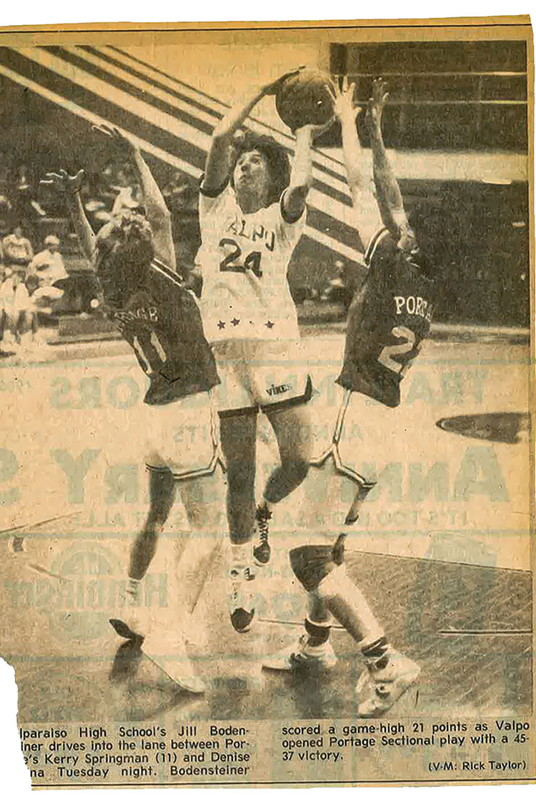 Jill Bodensteiner playing basketball as a high school student