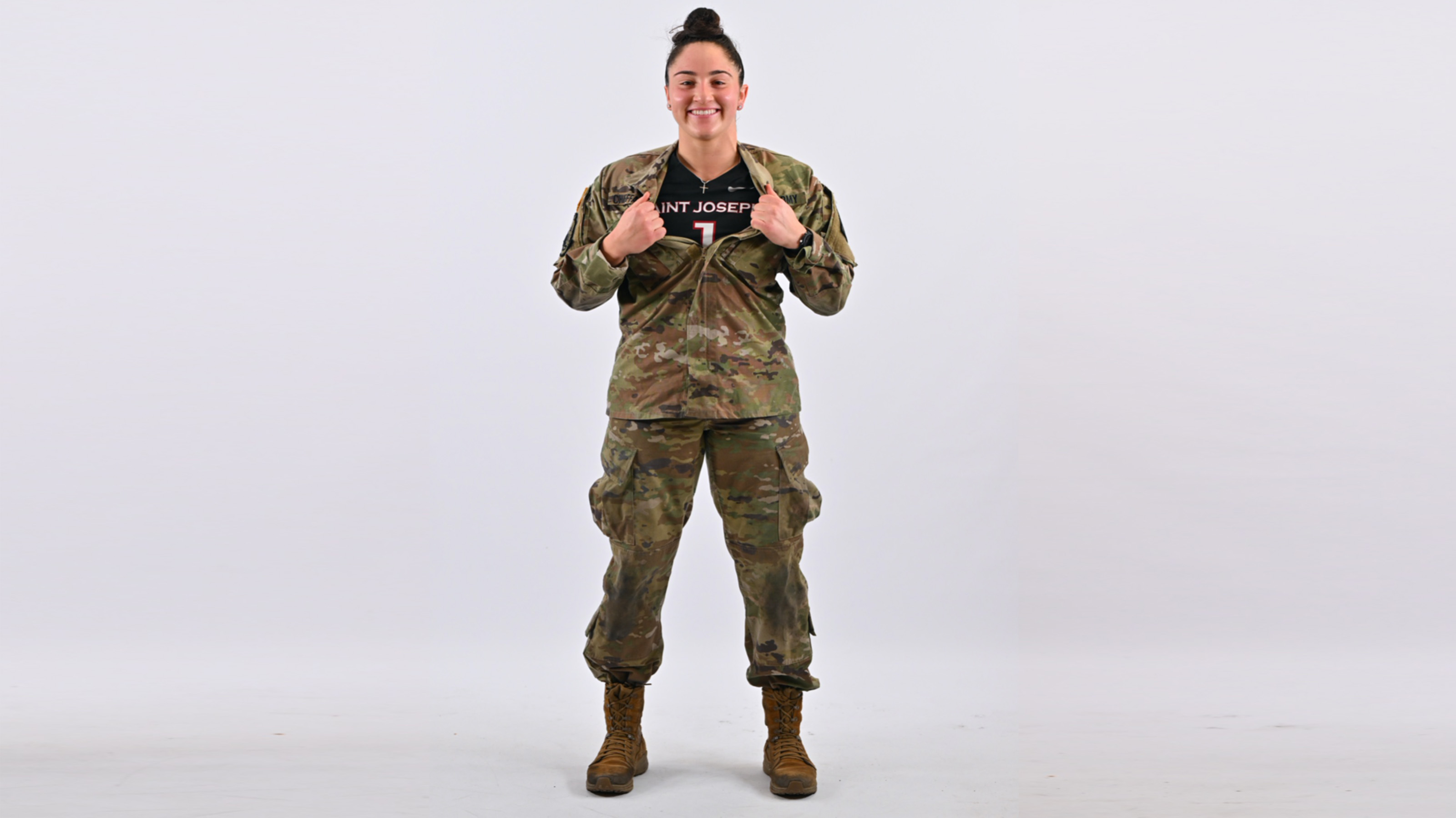 Carina Chiefalo shows her lacrosse jersey under her ROTC uniform
