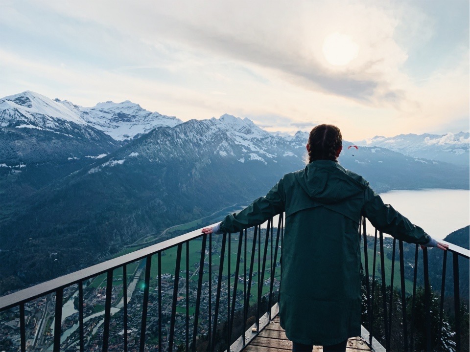 girl facing mountains