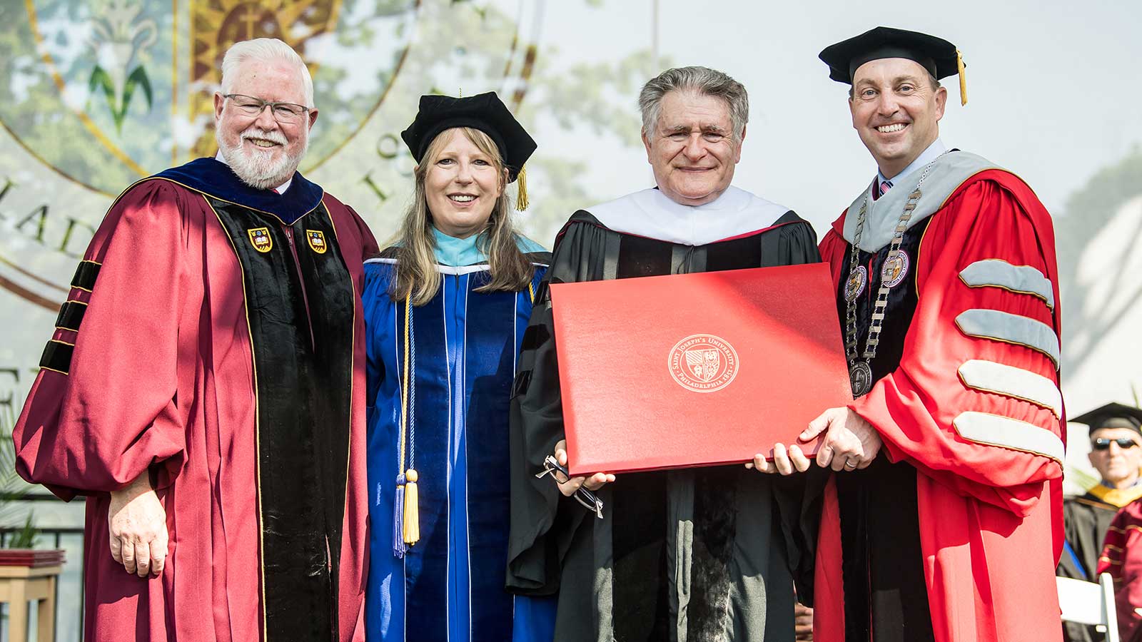 A group of people in graduation robes