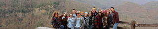 A group of students pose at the appalachian mountains
