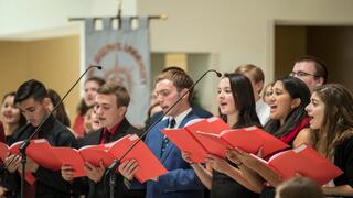 A choir singing in the Chapel of St Joseph