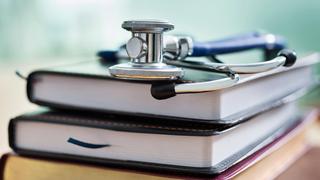 stethoscope on top of books