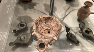 Roman oil lamp depicting a racing two-horse chariot (biga). Penn Museum. Credit: Picture taken by Konstantinos P. Nikoloutsos. 