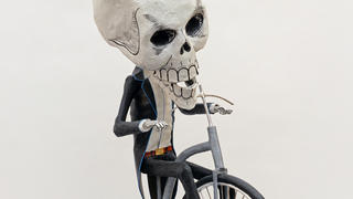 skeleton on bike