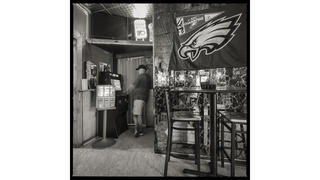 payphone with eagle's flag