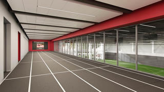 Saint Joseph's University students running on the indoor multi-use track.