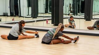 O’Pake Fitness and Recreation Center photo of two students stretching