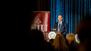 John Glomb at podium