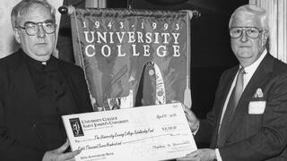 1993: Nicholas S. Rashford, S.J., and Charles D. Brennan at a scholarship fundraising event for University College during the 50th anniversary.