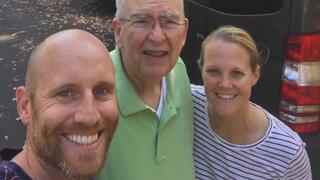 Jon Robichaud, his wife, and Father Nicholas Rashford