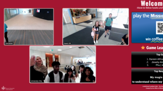 Screenshot of the SJU Portal between campuses. Shows students waving to each other over a video conference