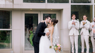 bride and groom kissing