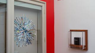 Install view of pens arranged in starburst shape.