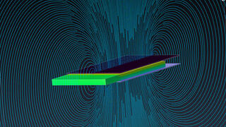 Blue field lines surround a simulated parallel plate capacitor with a dielectric in the middle.