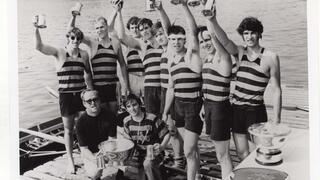 Members of men's rowing team with Dad Vail Regatta trophy, 1970.