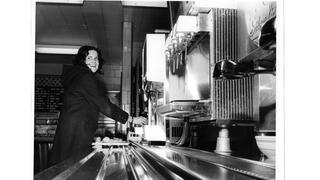 Student in cafeteria, 1980.