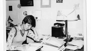 Student studying in dorm room in King Hall, LaFarge Residence Canter, 1975.