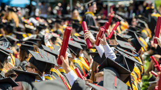 students wearing graduation caps