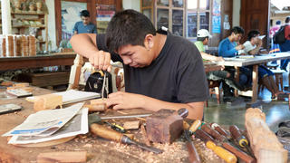 a man doing wood work