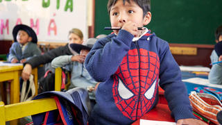 a young boy in a classroom