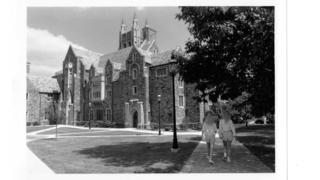 Exterior%20front%20view%20of%20Barbelin%20building%20with%20two%20students%20walking.jpg