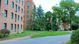 exterior of merion gardens apartments in philadelphia, pa