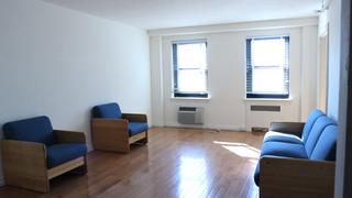 living room inside merion gardens apartments in philadephia, pa
