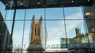 Barbelin Tower at Saint Joseph's University reflection in the Drexel Library window