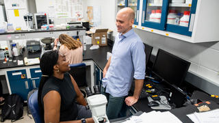 professor and student doing lab work at saint joseph's university