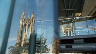 Barbelin Tower in the reflection of the library