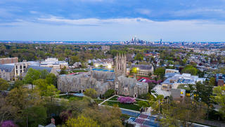 Aerial shot of Saint Joseph's University and the Philadephia skyline during sunset