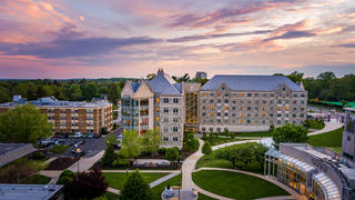 drone shot of saint joseph's university's villiger hall during sunset