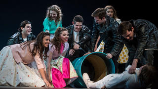 Students performing The Who's Tommy in Bluett Theatre