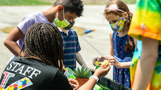 Kinney Center member helping children