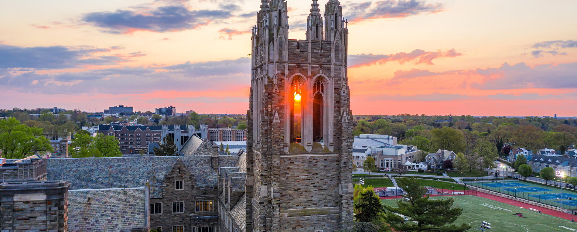 Aerial view of Barbelin hall at Saint Joseph's University with Philadelphia skyline in the background
