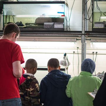 Geokids fellow with students