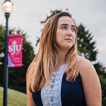 Saint Joseph's University Graduate student looking across campus