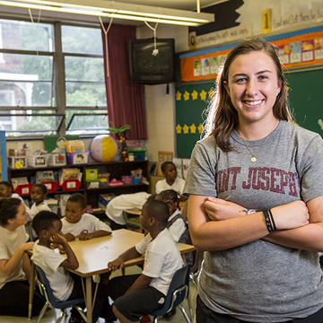 student working in an elementary school classroom