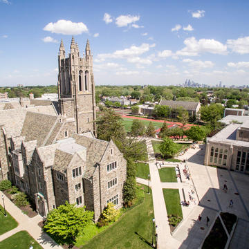 An aerial photograph of Barbelin Hall and the green campus of Saint Joseph's University Hawk Hill campus