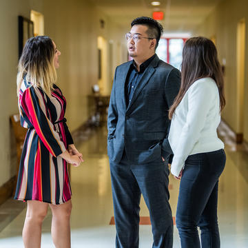 people standing in hallway at Saint Joseph's University
