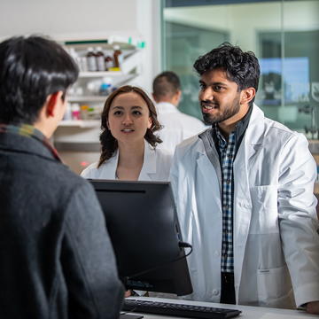 Pharmacy Students in mock pharmacy for Saint Joseph's University