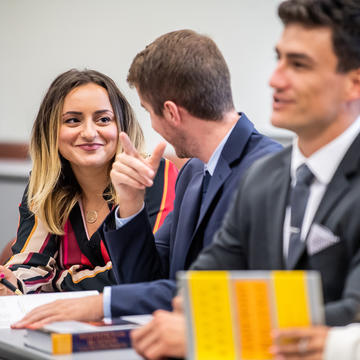 SJU business students engaging in class