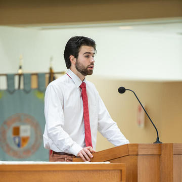 Speaker at pulpit in a chapel