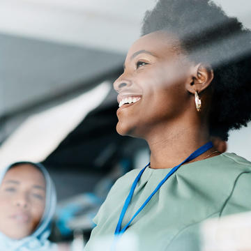 Two female health administration professionals