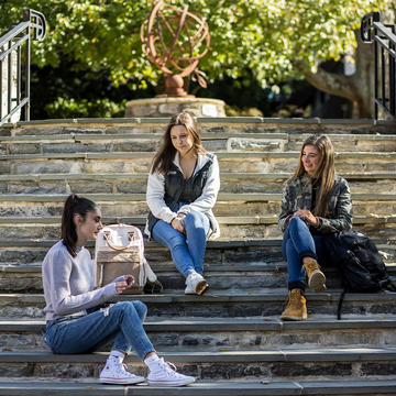 Saint Joseph's University students sitting on the perch steps
