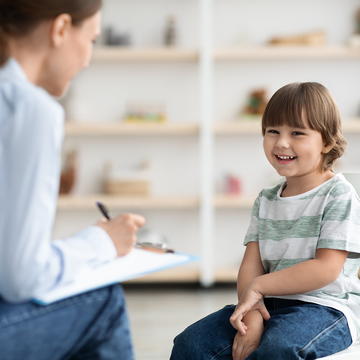 Saint Joseph's University school counselor working with a student.