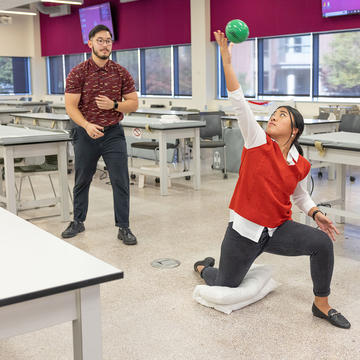 Physical Therapy Students working on an exercise.