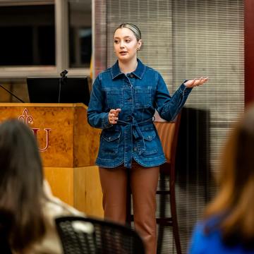 Woman delivering a presentation