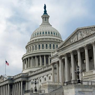 Government building with the U.S. flag hanging on it